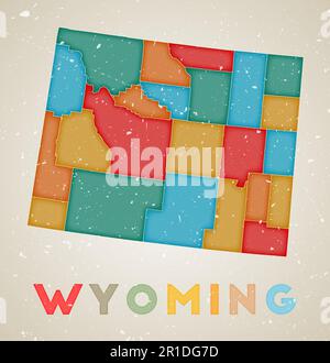 Wyoming map. Us state poster with colored regions. Old grunge texture. Vector illustration of Wyoming with us state name. Stock Vector