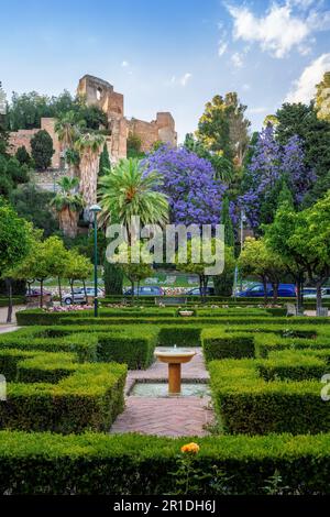 Pedro Luis Alonso Gardens with Alcazaba Fortress - Malaga, Andalusia, Spain Stock Photo