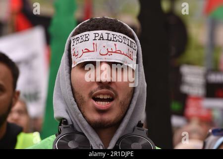 London, England, UK. 13th May, 2023. Demonstrators march in support for Palestine in central London. Palestinians commemorate the 75th anniversary of Nakba Day, also known as the Palestinian Catastrophe, which involved the destruction of Palestinian society in 1948, as well as the continuing displacement of many Palestinian people from their homeland. (Credit Image: © Thomas Krych/ZUMA Press Wire) EDITORIAL USAGE ONLY! Not for Commercial USAGE! Stock Photo