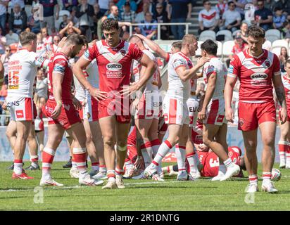 Salford Red Devils celebrates with try scorer Deon Cross #28 of