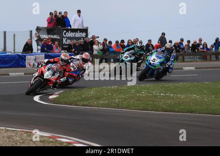 Antrim, Northern Ireland, UK. 13th May 2023: fonaCAB Nicholl Oils North West 200, Portrush, Antrim, Northern Ireland: North West 200 Race Day 2023: Glenn Irwin (Ducati - BeerMonster Ducati) takes his eighth straight SuperBike victory at the NorthWest 200, ahead of Alastair Seeley (BMW - Milwaukee BMW Motorrad) in second, Dean Harrison (Kawasaki - DAO Racing) in third and Michael Dunlop (Honda - Carl Cox Motorsport by Hawk Racing) in fourth Credit: Action Plus Sports Images/Alamy Live News Stock Photo