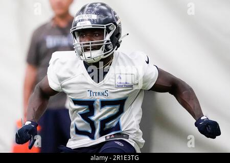 Tennessee Titans running back Tyjae Spears, right, runs the ball as  Jonathan Ward (33) defends during an NFL football training camp practice  Saturday, July 29, 2023, in Nashville, Tenn. (AP Photo/Mark Zaleski