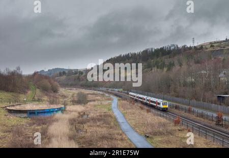 Transport For Wales class 170 Bombardier Turbostar train on the Ebbw Vale line approaching journeys end on the single track line Stock Photo