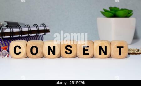 Consent - word from wooden blocks with letters, consent concept, on white background Stock Photo