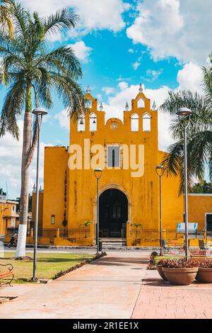 Chapel of Remedies, a bright yellow 16th century Gothic-style Catholic chapel in the town of Izamal, Yucatan, Mexico Stock Photo