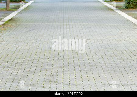 Stone block pathway at city Stock Photo
