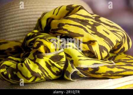 Close-up in detail of a colorful fabric with black and yellow colors. Perfect design for fashion design students, or clothing stores that are proud of Stock Photo