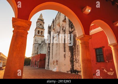 Sun sets over the Spanish colonial architecture of Plaza de la Independencia in Campeche, Mexico Stock Photo