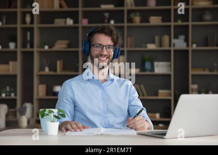 Happy successful adult online student man portrait Stock Photo