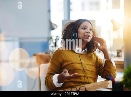 Talking, crm or woman in call center consulting, speaking or explaining at customer services. Virtual assistant, contact us or biracial sales Stock Photo
