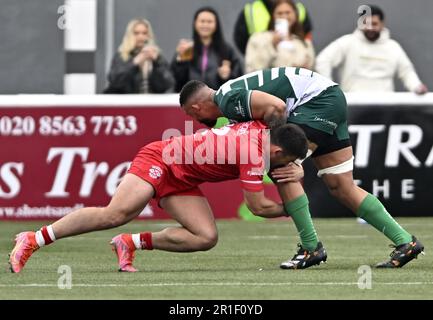 Ealing, United Kingdom. 13th May, 2023. Ealing Trailfinders V Jersey Reds RFU Championship Cup final. Trailfinders Sports Club. Ealing. Jordan Holgate (Jersey) tackles Bobby De Wee (Ealing) during the Ealing Trailfinders V Jersey Reds RFU Championship Cup final rugby match. Credit: Sport In Pictures/Alamy Live News Stock Photo