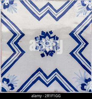 Old Traditional Portuguese azulejos, painted ceramic tilework. Stock Photo