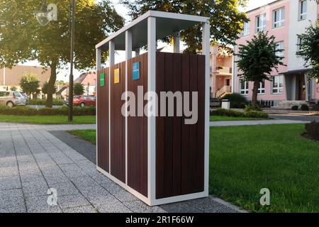 Different sorting bins for waste recycling outdoors Stock Photo