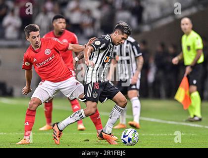 Belo Horizonte, Brazil. 13th May, 2023. Mineirao Stadium Matias Zaracho of Atletico Mineiro competes with Carlos de Pena of Internacional, during the match between Atletico Mineiro and Internacional, for the 6th round of the Brazilian Championship, at Estadio do Mineirao, this Saturday, 13. 30761 (Gledston Tavares/SPP) Credit: SPP Sport Press Photo. /Alamy Live News Stock Photo