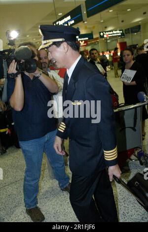 Captain Robert Ting, pilot of the first commercial Singapore Airlines A380 flight, between Singapore and Sydney, in the Arrivals Lounge of Sydney (Kingsford Smith) Airport. Sydney, Australia. 25.10.07. Stock Photo