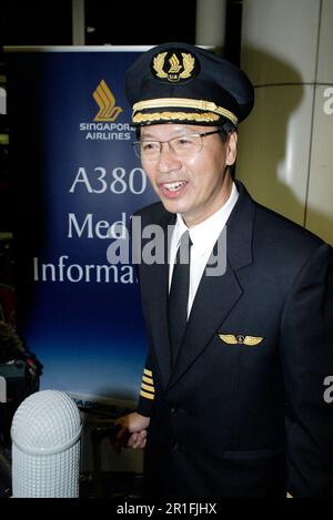 Captain Robert Ting, pilot of the first commercial Singapore Airlines A380 flight, between Singapore and Sydney, in the Arrivals Lounge of Sydney (Kingsford Smith) Airport. Sydney, Australia. 25.10.07. Stock Photo