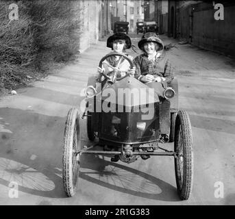 Archival Photo: Young women in an automobile ca. 1910s or 1920s Stock Photo