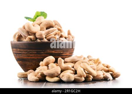 Bowl with cashew nuts isolated on white background Stock Photo
