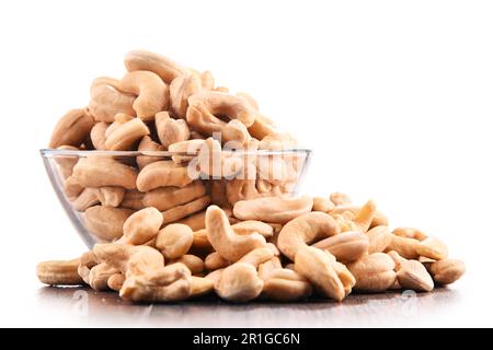 Bowl with cashew nuts isolated on white background Stock Photo