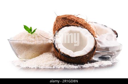 Composition with shredded coconut and shells isolated on white background Stock Photo