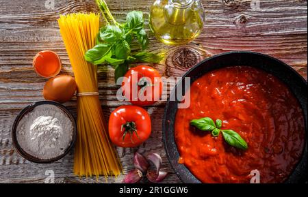 Composition with dried spaghetti, and pasta ingredients Stock Photo