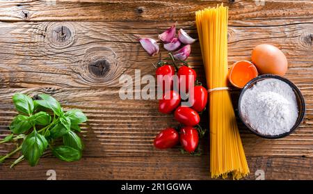 Composition with dried spaghetti, and pasta ingredients Stock Photo