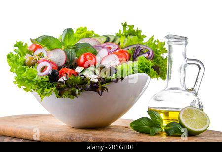 Vegetable salad bowl isolated on white background Stock Photo