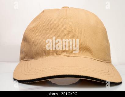 Front view of a brown baseball hat on a white background Stock Photo