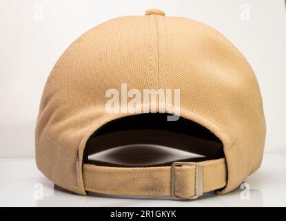 Back view of a brown baseball hat on a white background Stock Photo