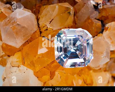 Sparkling asscher cut diamond on a rough crystal Stock Photo