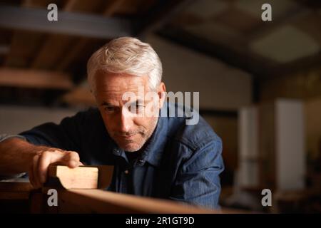 Wood, maintenance and senior man with a project, renovation or small business with tools. Male entrepreneur, carpentry designer or builder with Stock Photo
