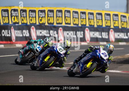 Portstewart, UK. 13th May, 2023. Dean Harrison, Richard Cooper and Michael Dunlop Navigating the Chicane at the Northwest 200 Race 2 Supersport Class bike. Davey Todd was the Winner of the race, with Richard Cooper second and Peter Hickman third Credit: Bonzo/Alamy Live News Stock Photo