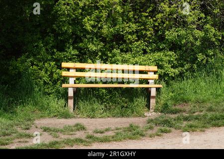 A bench invites you to rest Stock Photo