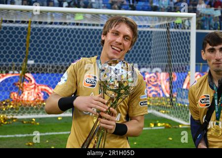 Saint Petersburg, Russia. 13th May, 2023. Daniil Odoevskiy (71), Zenit Football Club player celebrates after the match of the 27th round of the Russian Premier League season 2022/2022, Zenit - Krasnodar, where after the Zenit players were awarded gold medals. Zenit 2:2 Krasnodar. (Photo by Maksim Konstantinov/SOPA Images/Sipa USA) Credit: Sipa USA/Alamy Live News Stock Photo