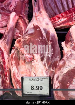 Raw lamb meat on the ribs lies in the supermarket Stock Photo
