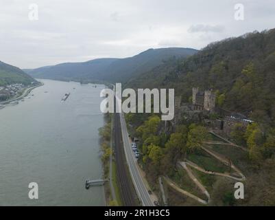 The Burg Rheinstein castle, it is one of thelargest and famous castles on Rhine river in Germany. Aerial drone video. Stock Photo