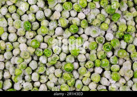 Close up of delicious frozen Green Peas islated with copy space Stock Photo
