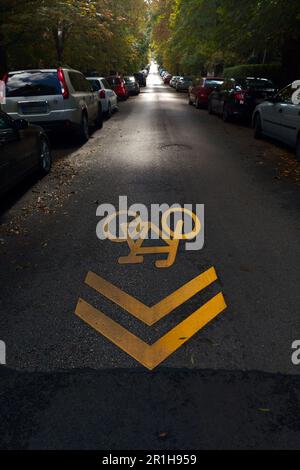 Bicycle sign on a side street Stock Photo