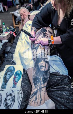 London, UK. 14th May, 2023. Featuring the best tattoo artists from across the globe, Alexandra Palace open its doors for all ink enthusiastic to get a new art work tattooed in their skin. Paul Quezada- Neiman/Alamy Live News Stock Photo