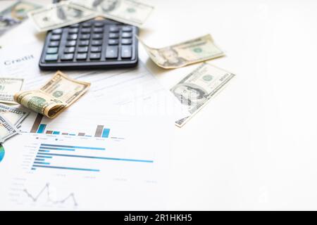 US dollar banknotes on charts graphs paper. Financial development, Banking Account, Statistics, Investment Analytic research data economy. Stock Photo
