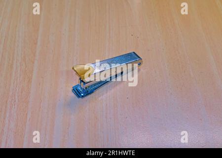 jakarta indonesia, 14 may 2023, paper staples on a wooden desk in an office Stock Photo