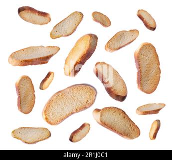 Falling hard chuck crackers on white background Stock Photo