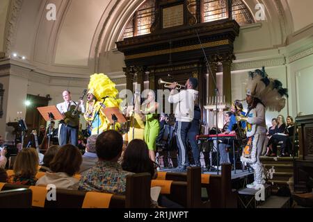 NEW ORLEANS, LA, USA - APRIL 28, 2023: The Cha Wa band performs with the cantor and other musicians at of Touro Synagogue for Jazzfest Shabbat Stock Photo