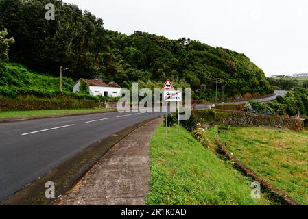 Quatro Ribeiras, Portugal - July 1, 2022: Sign indicating the end of the municipal district on the road on the north coast of the island of Terceira i Stock Photo