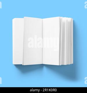 Back to school concept , hard cover blank white book pages lifted open isolated on blue. Stock Photo