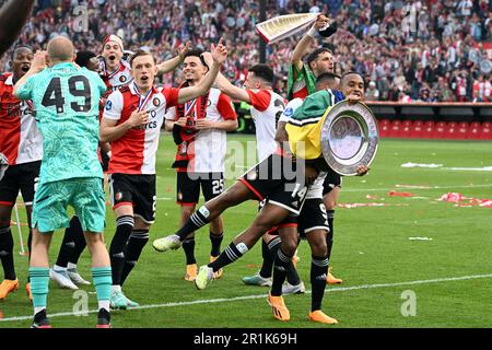 ROTTERDAM - (lr) Feyenoord goalkeeper Tein Troost, Marcus Pedersen of Feyenoord, Mohamed Taabouni of Feyenoord, Oussama Idrissi of Feyenoord, Santiago Gimenez of Feyenoord, Igor Paixao of Feyenoord, Danilo of Feyenoord with the champion scale, with the trophy, with the dish na outcome of the Dutch premier league match between Feyenoord and Go Ahead Eagles at Feyenoord Stadion de Kuip on May 14, 2023 in Rotterdam, Netherlands. ANP OLAF KRAAK Stock Photo