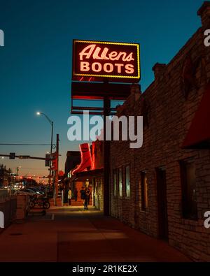 Allens Boots vintage neon sign at night, Austin, Texas Stock Photo