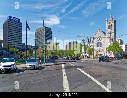 Columbus Circle, with its monument, fountains and plaza, is a tourist attraction at the intersection of Montgomery, Jefferson, and Onondaga Streets. Stock Photo
