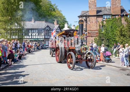 Lymm May Queen and Rose Queen 2023. Aveling & Porter steam engine passes through the village Stock Photo