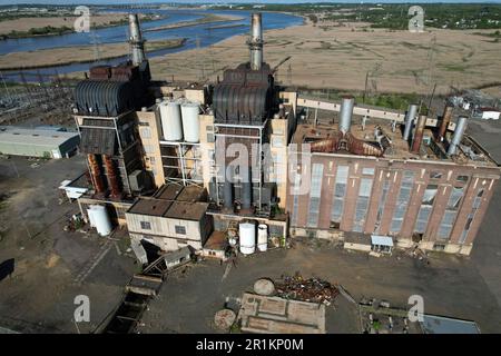 Aerial view of an old coal burning power plant along the Raritan River in Sayreville, New Jersey Stock Photo